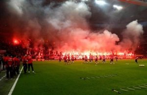 Galatasaray fans prepare for derby as they set off flares during training session